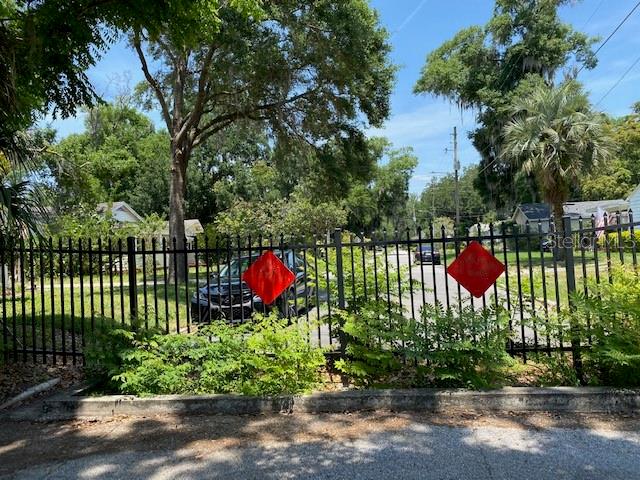Fence on Cordova separating Commercial from Residential area.