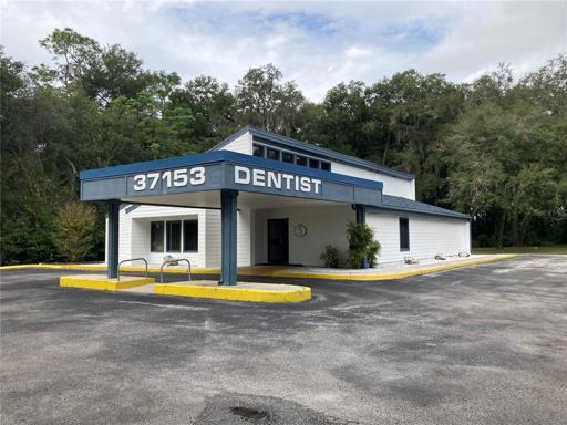 Dentist Office is located on SR 54 and is in front of the Property for sale. Office is on the West side of Flint Drive.