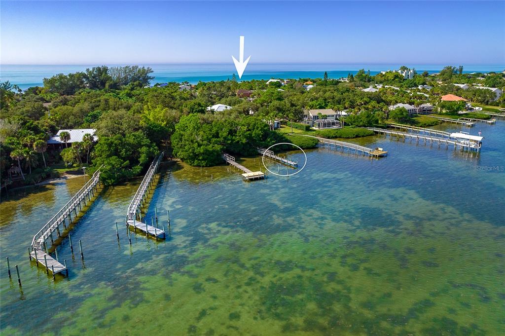 Home is on Beach/Gulf Side (Arrow), Deeded Dock First Come First Serve On Bay Side (circled)
