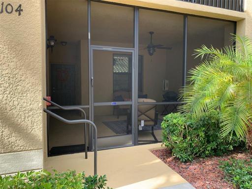 Front Entry w/ Screened Lanai