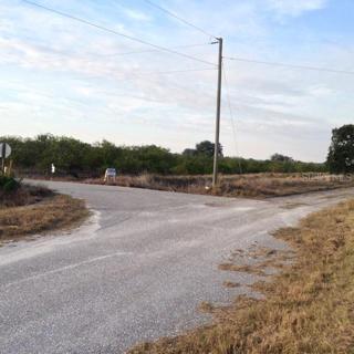 Turn off of road here to go to the 10 acres.  Pavement turns west here.