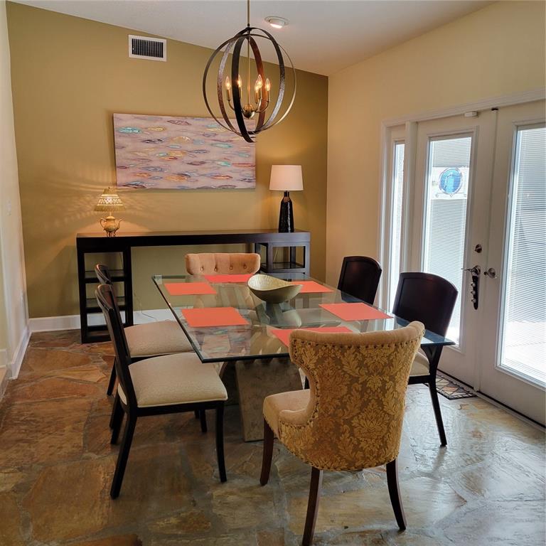 Sunken dining room adjacent to kitchen