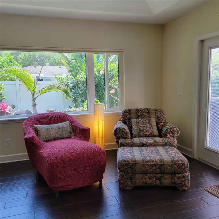 Double French doors lead to outdoor relaxing and entertaining area