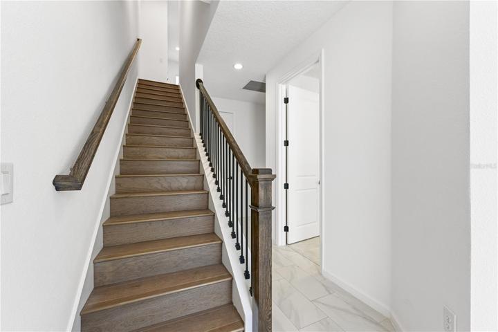 First floor entry. Office, half bath and access to 1-car garage.