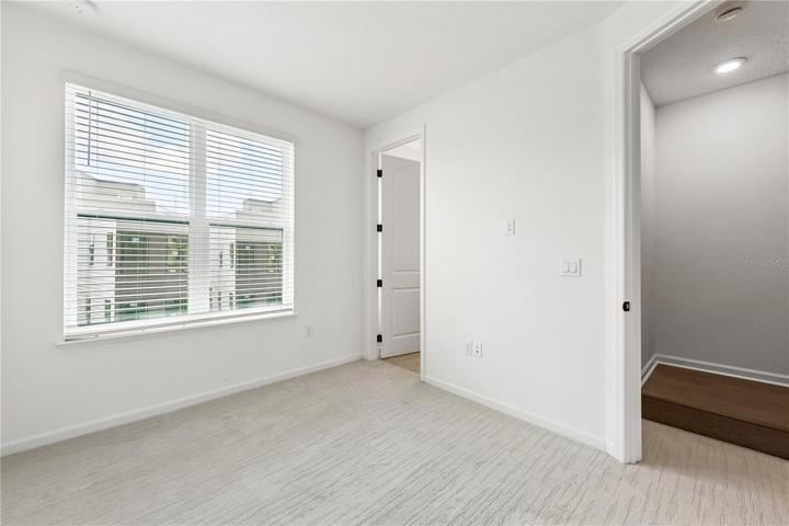 Secondary bedroom with private bathroom.