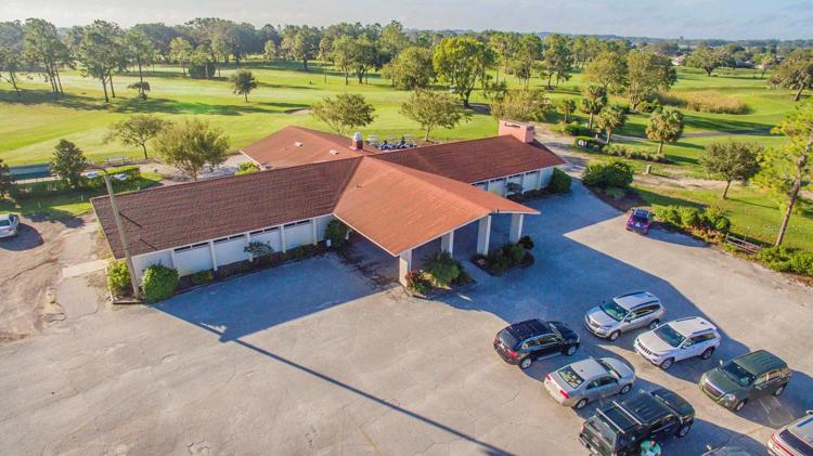 Clubhouse on 2 acres parking and cart barn