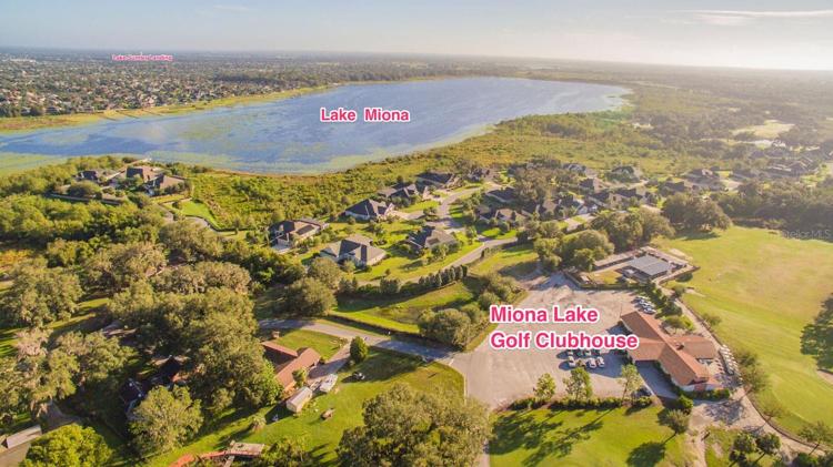 Club house parking lot with view of Lake Miona