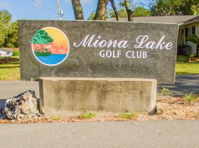 Lake Miona golf club entry sign on County Road 121