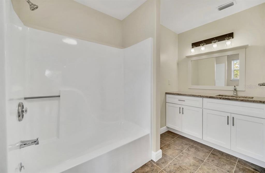 One of three second-story bathrooms