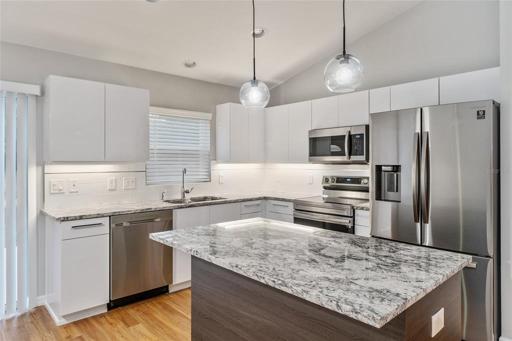 GLASS PENDENT LIGHTING & CAN LIGHTS