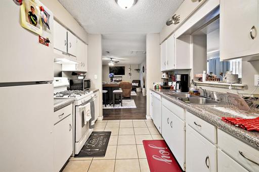 Kitchen leading to Living/Dining Room