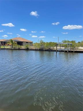 View of property from across canal