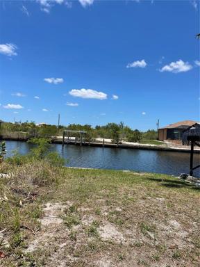 View of property from across canal