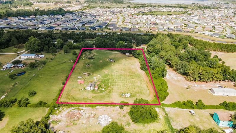 Aerial view of 4.05 acres with 3 bedroom 3 bath