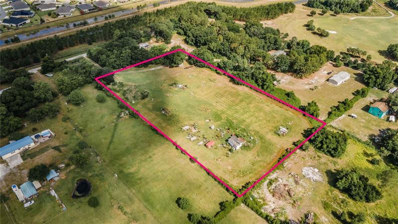 Aerial view of 4.05 acres with 3 bedroom 3 bath