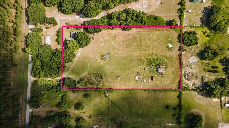 Aerial view of 4.05 acres with 3 bedroom 3 bath