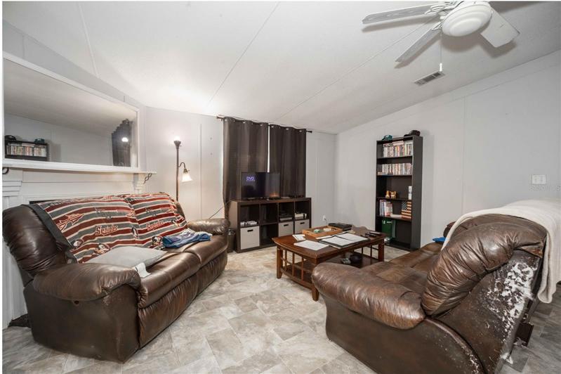 Living area with access to kitchen