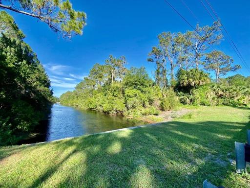 Duplex land lot on a Canal - corner lot on your right