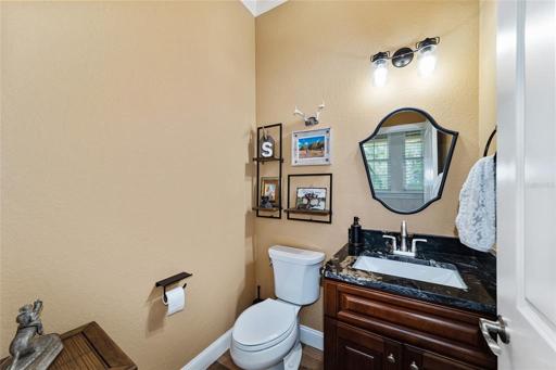 Hallway half bath near game room