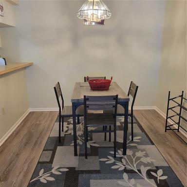 Dining room adjacent to kitchen with pass thru