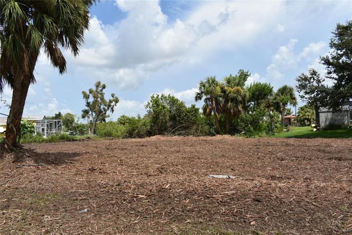 Cleared Lot - looking toward the canal with dock.