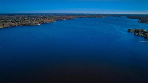 Facing South/East, facing towards downtown Tampa, displaying Lake Tarpon.