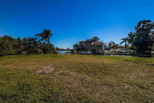 Facing South East, standing on the property looking out towards the canal and Lake Tarpon.