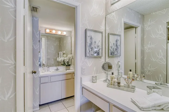 Ensuite Master Bathroom with separate vanity area across from the walk-in closet.