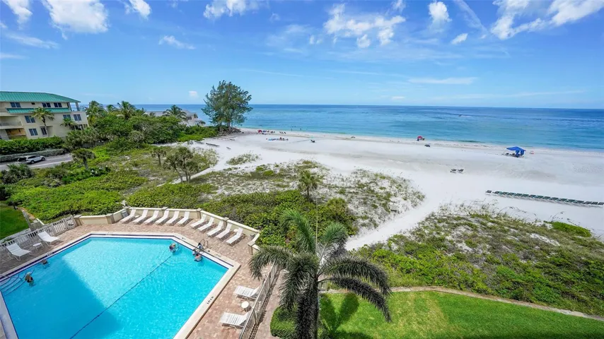 Beachside pool and 180 degree views of Whispering Sands' beach and the Gulf from the balcony.