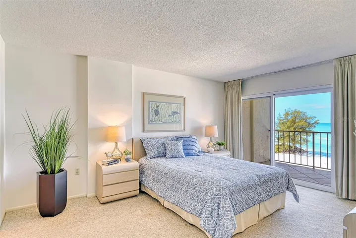 Master Bedroom also features hurricane impact sliders opening into the balcony.