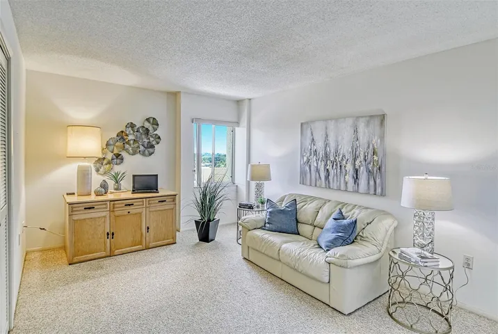 Bedroom #2 with nice east facing lagoon view has options as a 2nd bedroom, office, or den.
