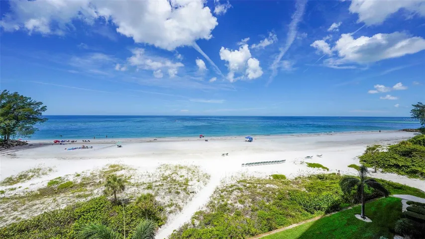 Whispering Sands' 800' of powdery quartz sand beach on the Gulf of Mexico.