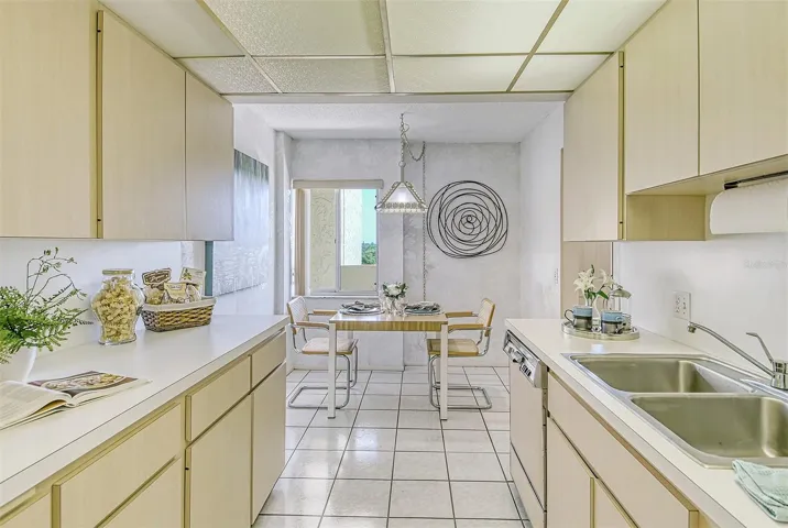 View from Dining Room into the Kitchen and breakfast area with nice sunny window.