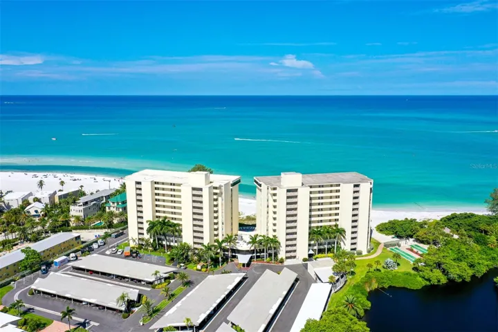 19 Whispering Sands is the tower building on the right.