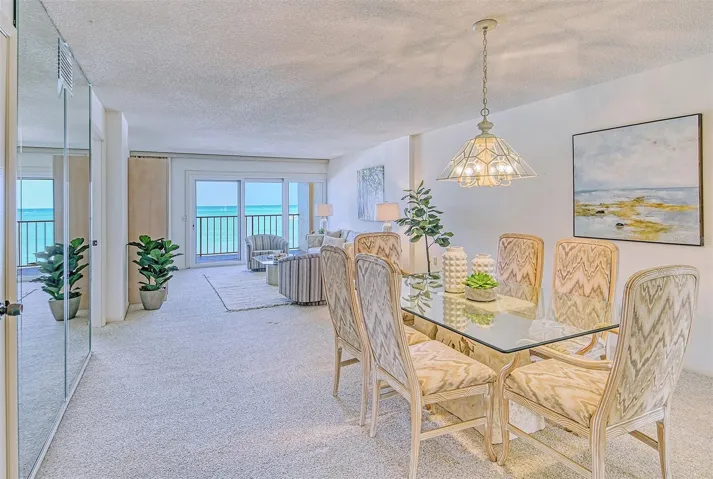 View from the entry hall into the Dining Room and Living Room - with a full direct view of the Gulf!