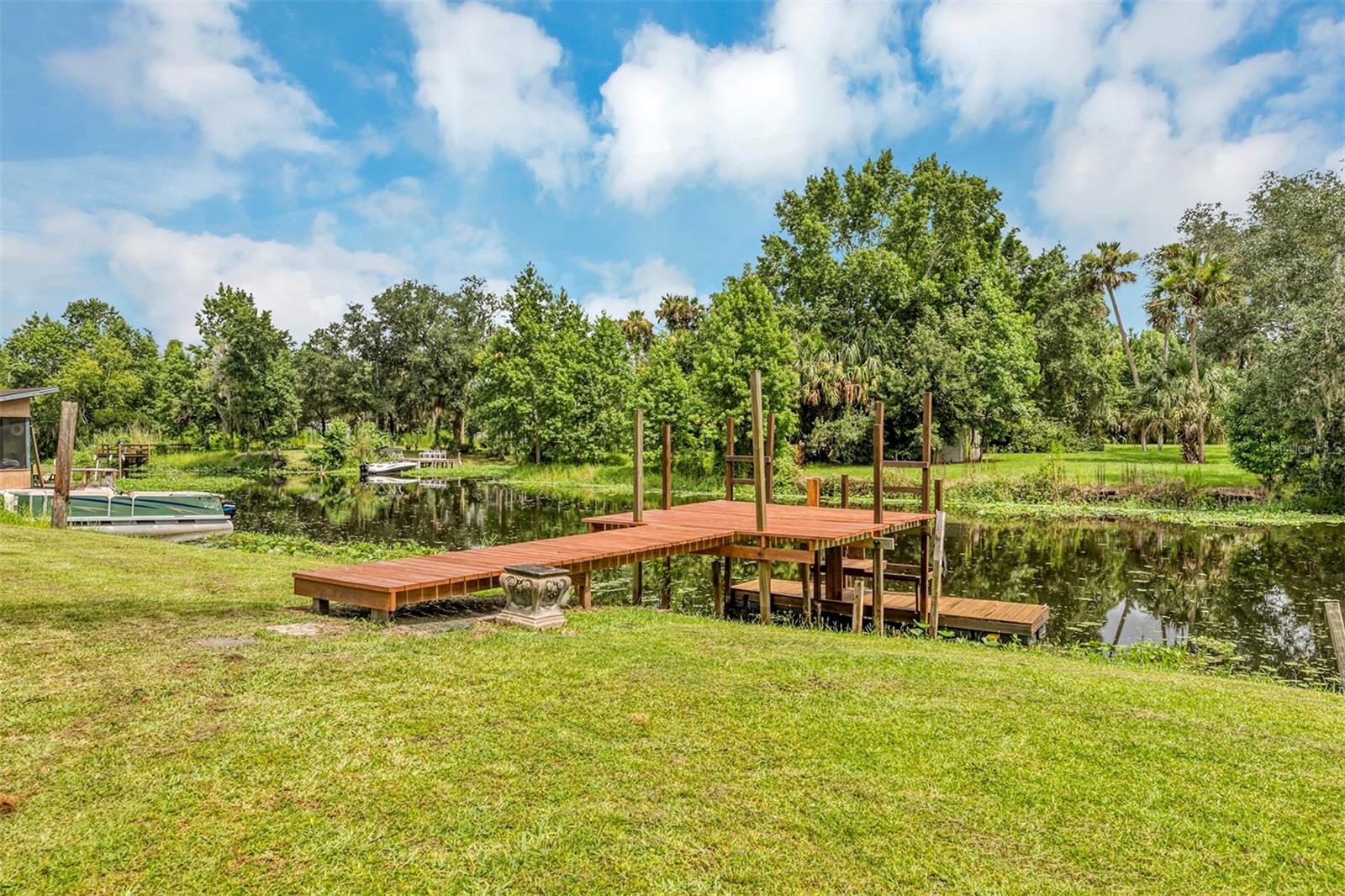 Dock with floating slip in deep water canal