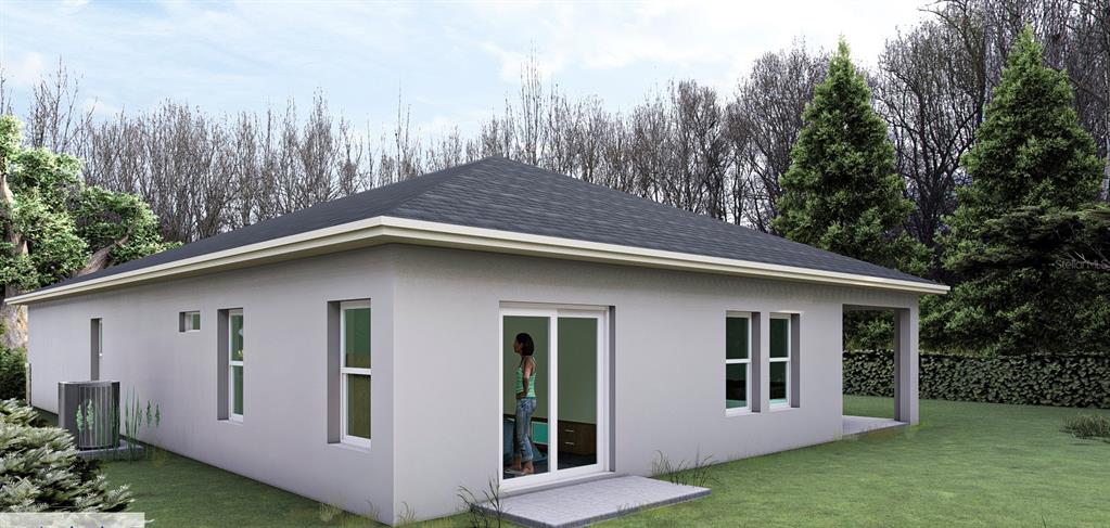 Back of the house with sliding door option for master bedroom 
