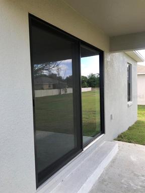 Sliding Glass Doors off of Covered Patio