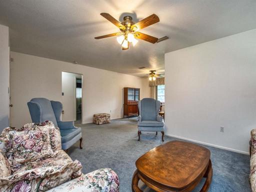 View from formal living room with entry hall leading to the two bedrooms