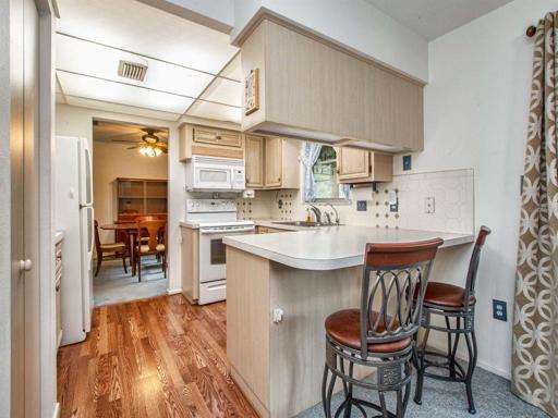 View from family room showcasing breakfast bar