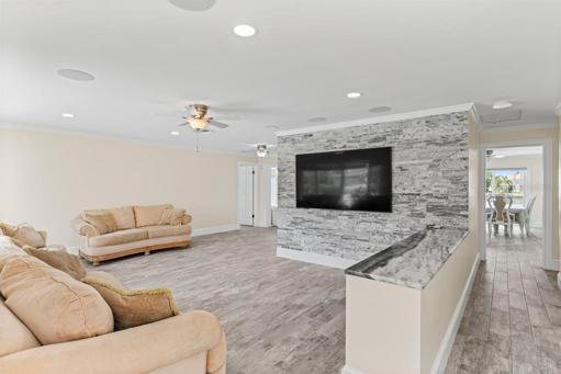 Main Living room looking toward dining room and canal