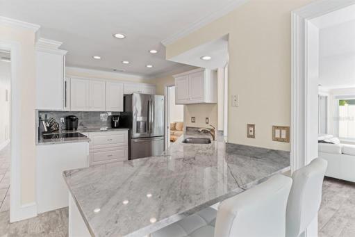 Kitchen looking toward main living and great room