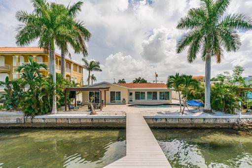 Rear view of home from dock and canal