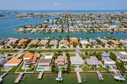Aerial front of home from canal looking west toward Gulf Beach