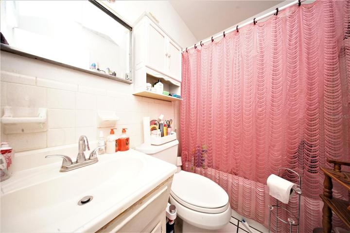 Bathroom with Bathtub and Ceramic-Tile Flooring