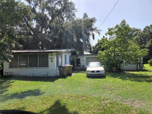 Home with view of garages