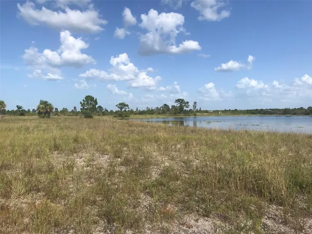 View of north and east shoreline of lake.