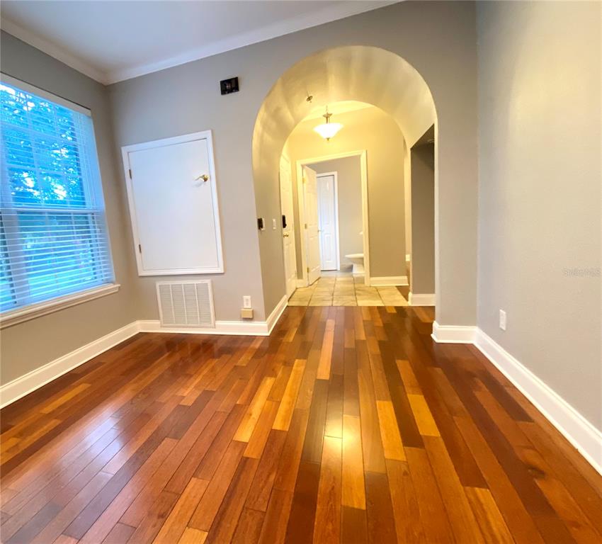 Front living room can be used as office space or separate living room