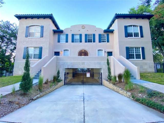Front of unit. Gated parking garage below units.