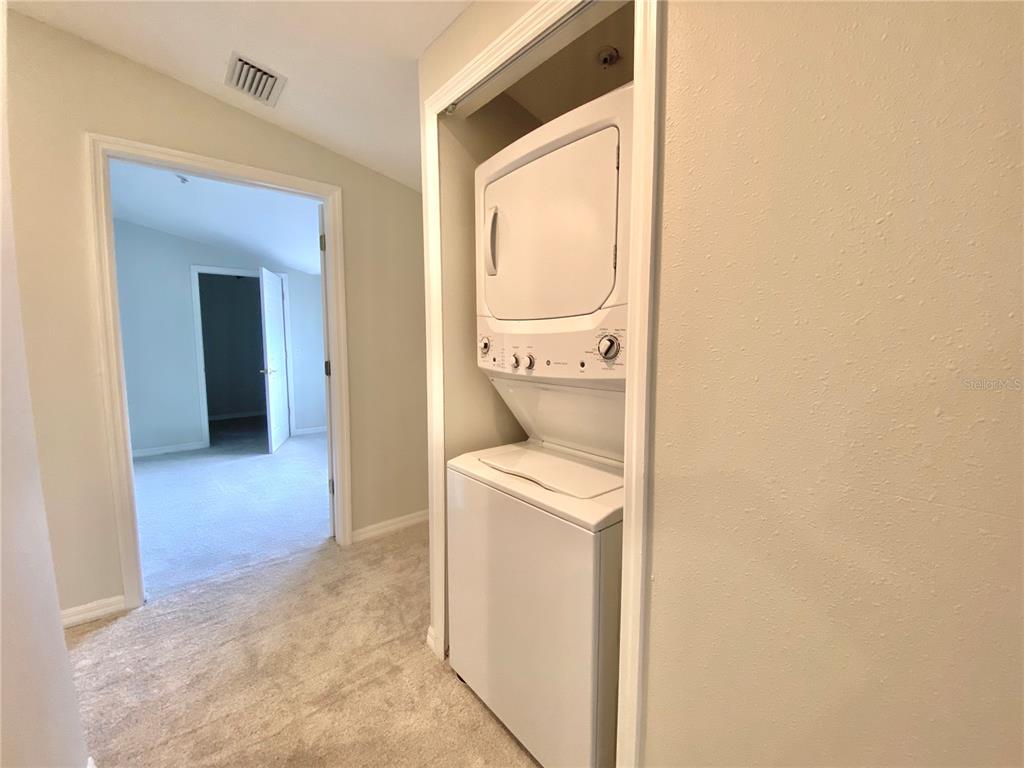 In unit stackable washer and dryer